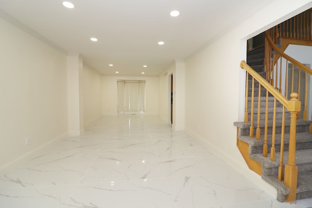 hall featuring baseboards, ornamental molding, marble finish floor, stairs, and recessed lighting