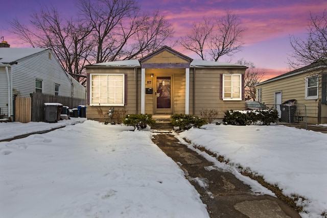 view of front of house with fence