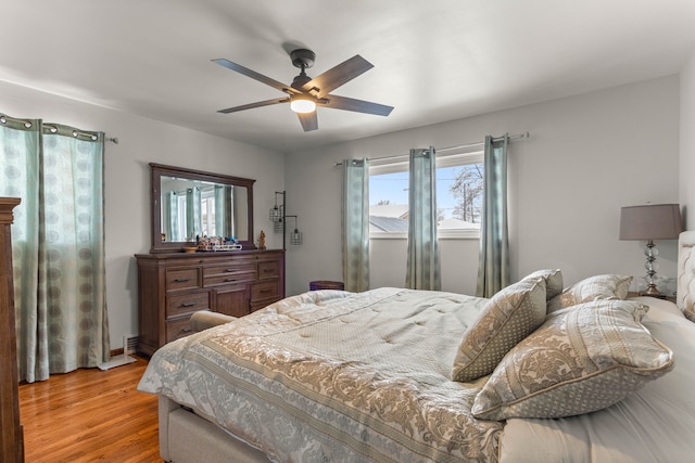 bedroom featuring ceiling fan and light wood finished floors