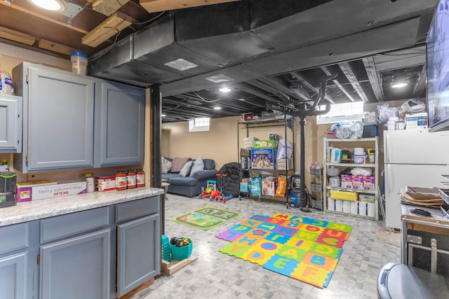 recreation room featuring light floors