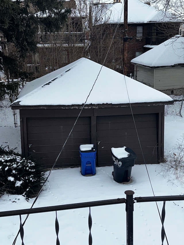 view of snow covered garage