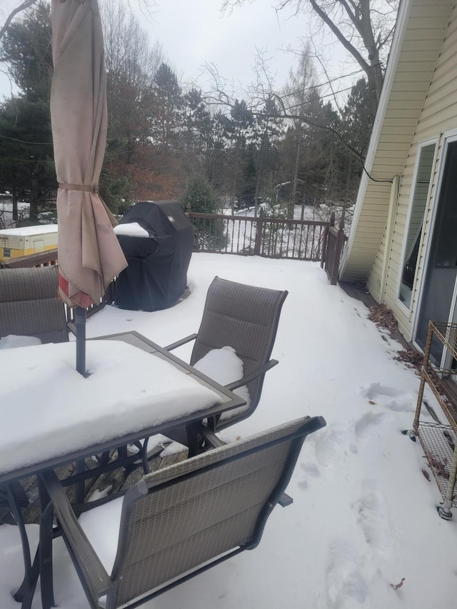 view of snow covered patio
