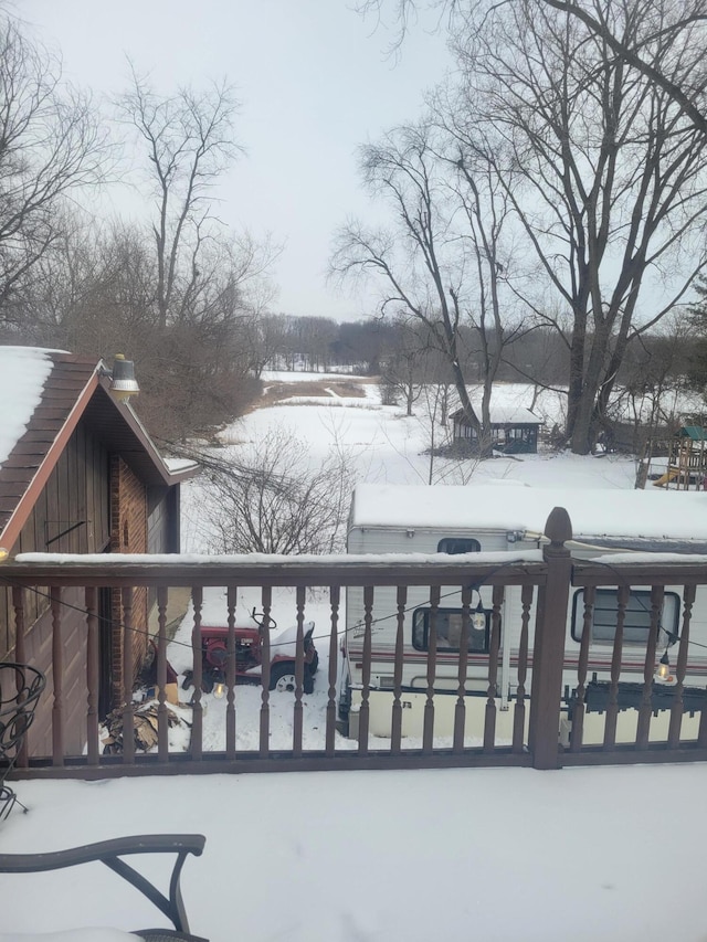 view of snow covered deck