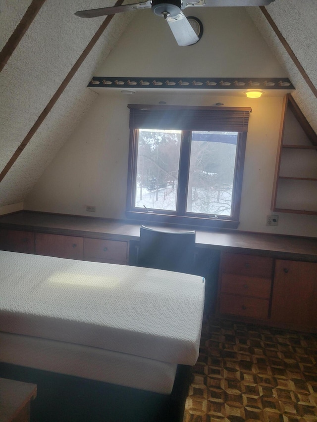 bedroom with lofted ceiling