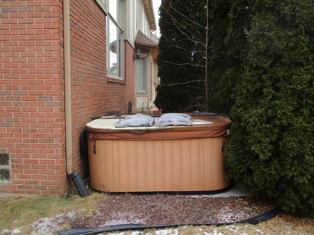 view of patio / terrace featuring a hot tub