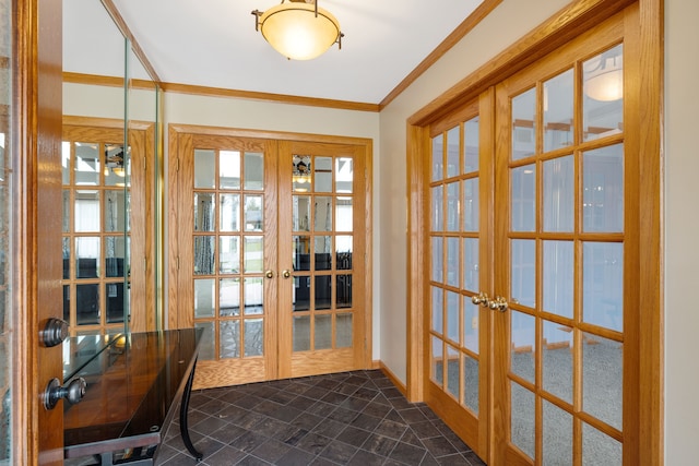 doorway to outside featuring baseboards, stone finish flooring, ornamental molding, and french doors