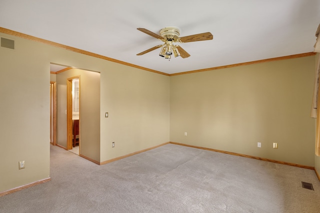unfurnished room with baseboards, a ceiling fan, light colored carpet, and visible vents