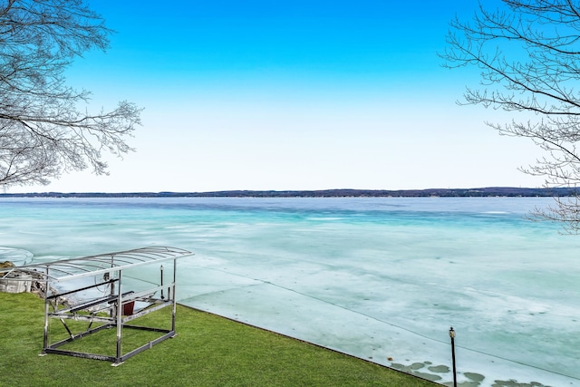 11375 SW Torch Lake Dr, Rapid City, MI 49676 - dock featuring a water view