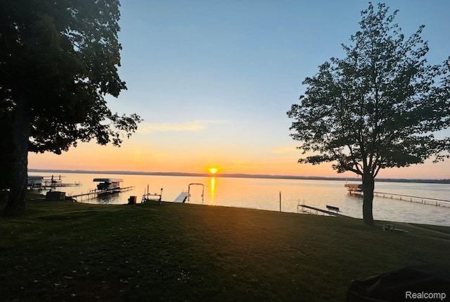 11375 SW Torch Lake Dr, Rapid City, MI 49676 - water view featuring a boat dock