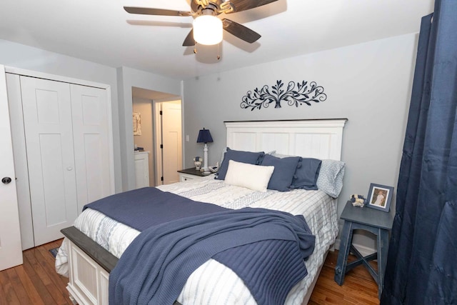 bedroom featuring a closet, wood finished floors, and a ceiling fan