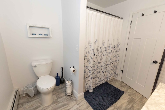 full bathroom with baseboards, toilet, a baseboard heating unit, and a shower with curtain