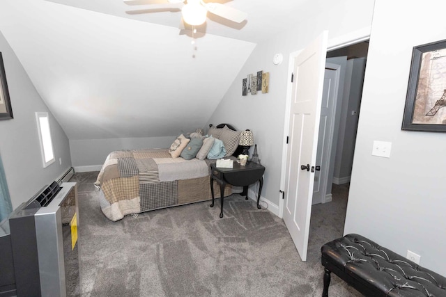 bedroom featuring vaulted ceiling, carpet flooring, baseboards, and ceiling fan