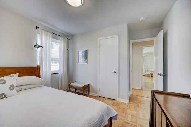 bedroom featuring baseboards