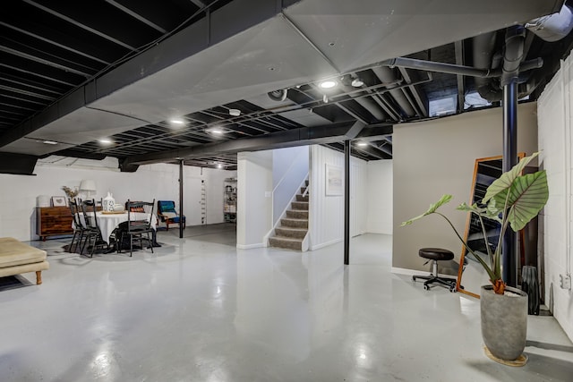 finished basement featuring stairway