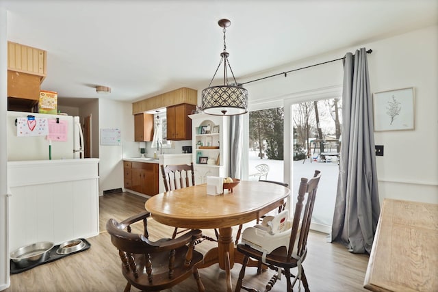 dining room featuring light wood finished floors