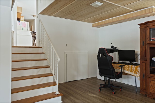 office with wood ceiling and dark wood finished floors