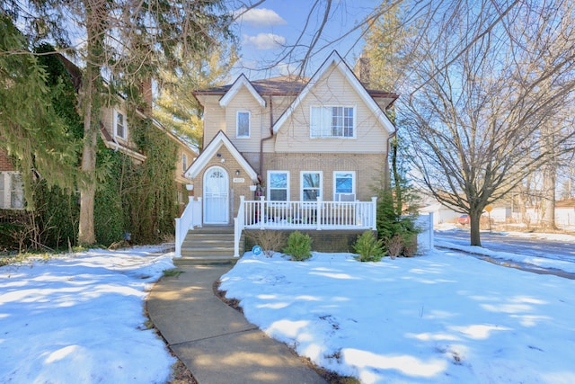 view of front of home featuring brick siding