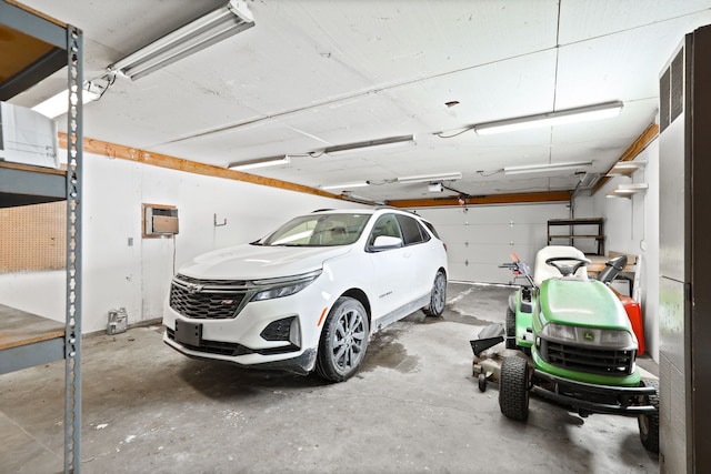 garage with a wall mounted AC