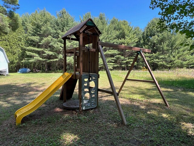 755 S M65 Rd, Twining, MI 48766 - view of jungle gym featuring a lawn