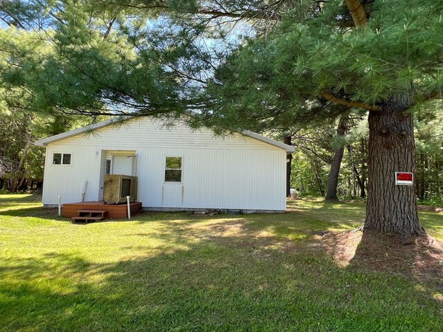 755 S M65 Rd, Twining, MI 48766 - back of house with a yard and a wooden deck