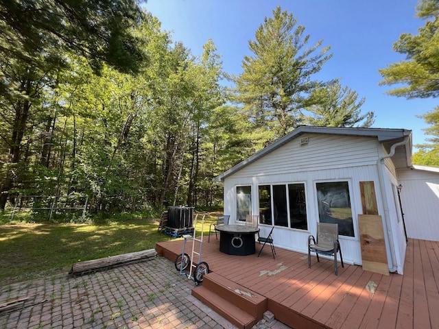 755 S M65 Rd, Twining, MI 48766 - deck featuring a yard and a patio