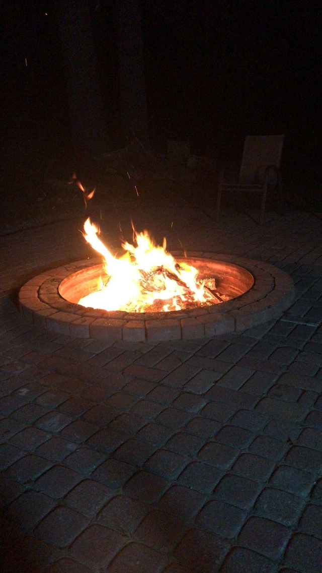 view of patio / terrace featuring a fire pit