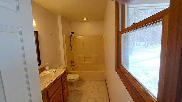 full bath featuring toilet, washtub / shower combination, and vanity