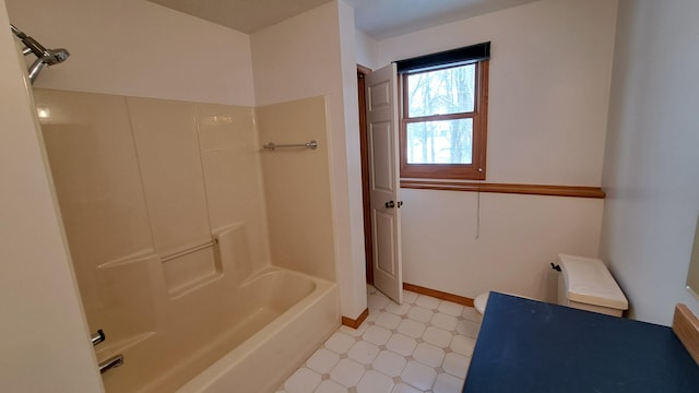 full bath with bathing tub / shower combination, baseboards, and tile patterned floors