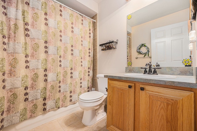 full bathroom featuring tile patterned flooring, vanity, and toilet