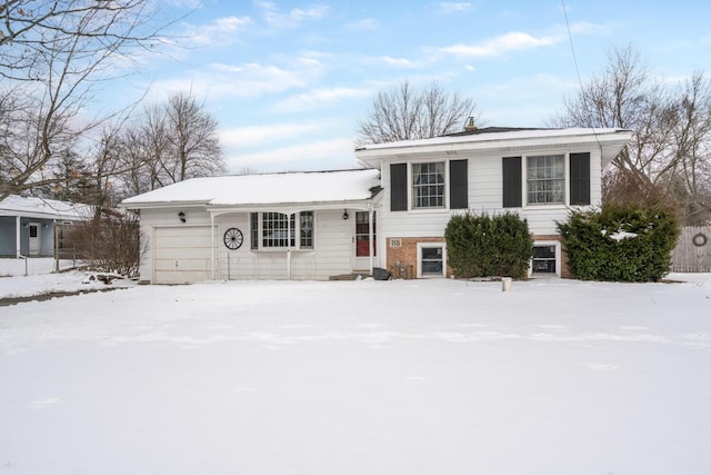 tri-level home featuring an attached garage