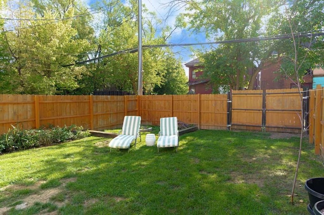 view of yard featuring a fenced backyard