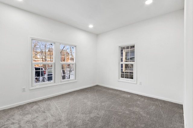 unfurnished room featuring recessed lighting, carpet flooring, and baseboards