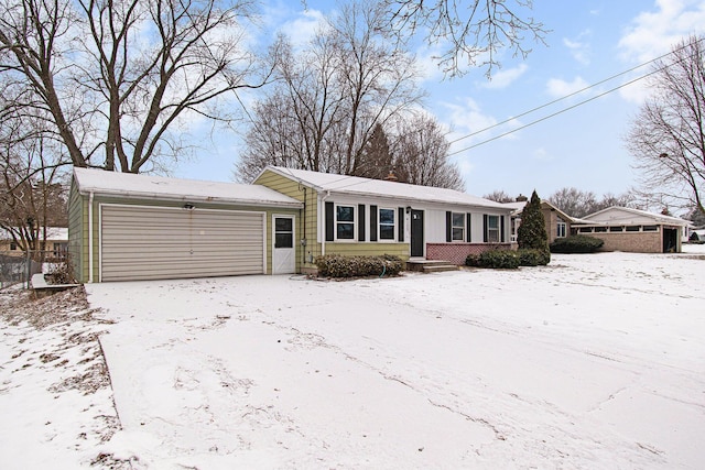 ranch-style home featuring an attached garage