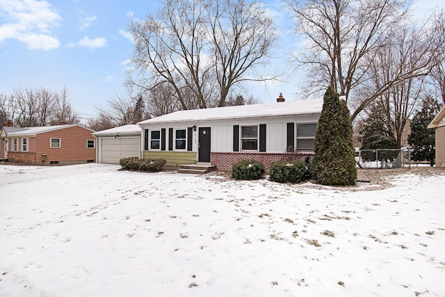 single story home featuring entry steps, brick siding, a detached garage, board and batten siding, and a chimney