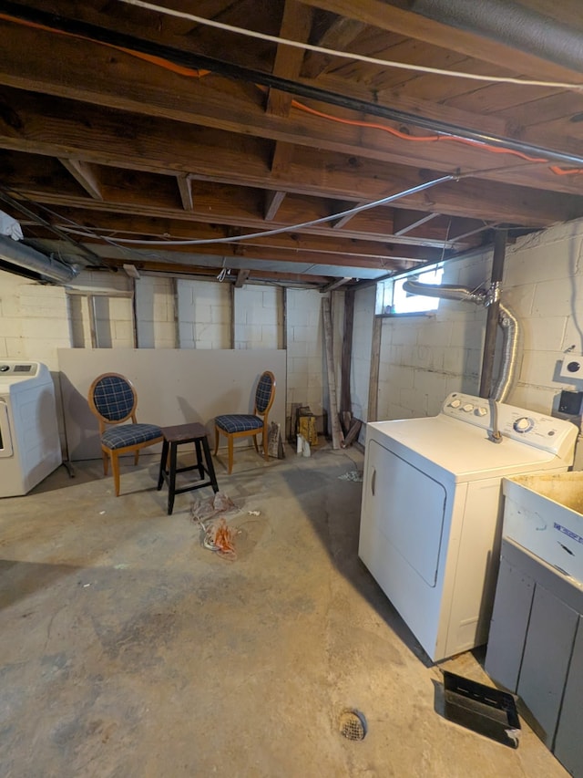 basement featuring washer and clothes dryer