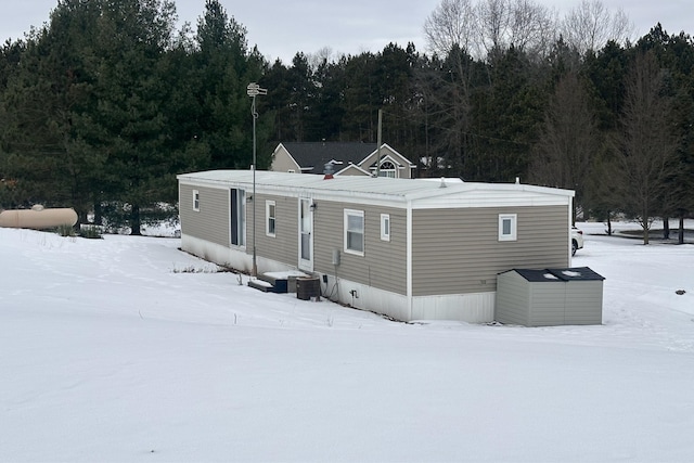 view of front of home featuring central air condition unit