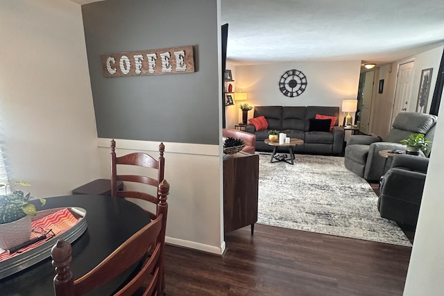 living area with dark wood-style flooring