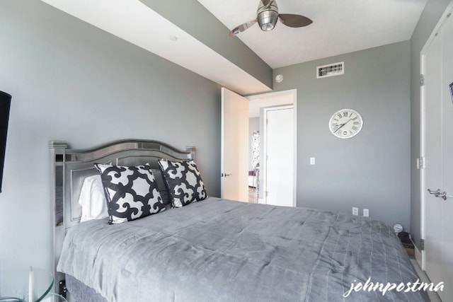 bedroom featuring ceiling fan and visible vents