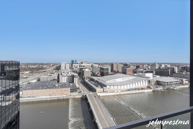 property's view of city with a water view