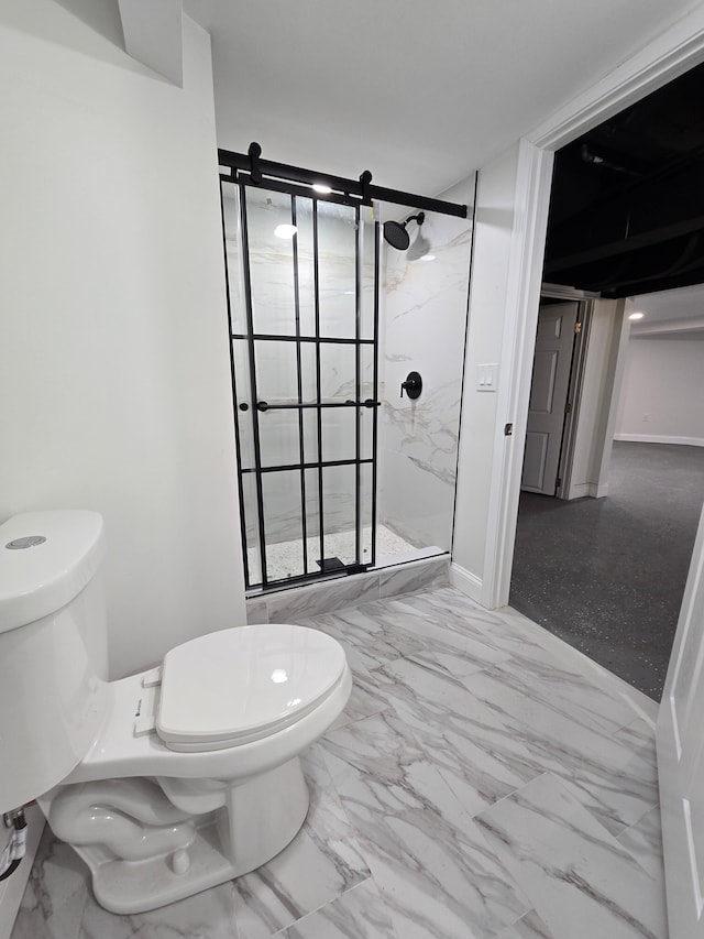 full bathroom with marble finish floor, a stall shower, and toilet