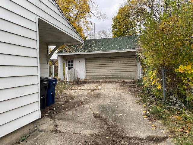 garage featuring driveway