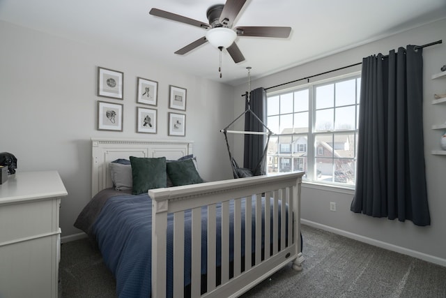 carpeted bedroom featuring ceiling fan and baseboards