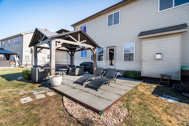 view of patio / terrace with a gazebo, outdoor lounge area, and fence