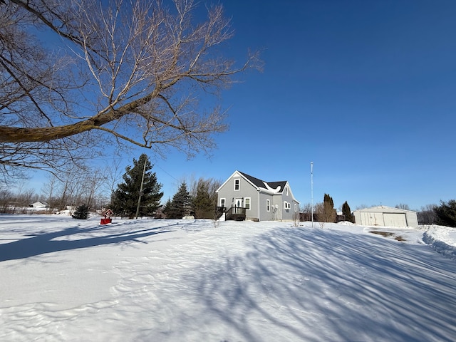 view of yard covered in snow