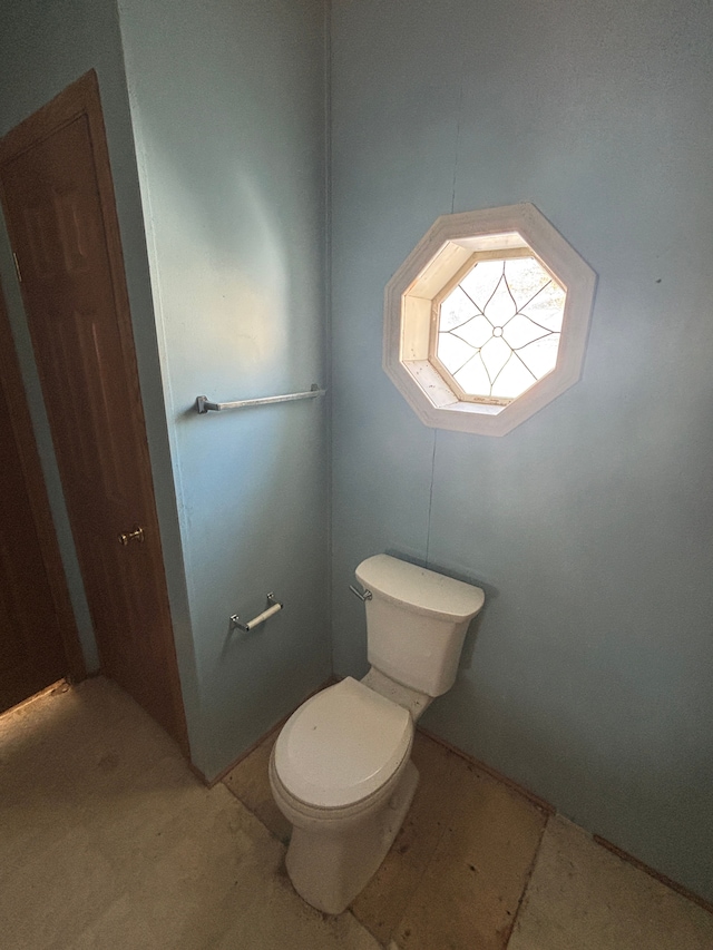 bathroom featuring toilet