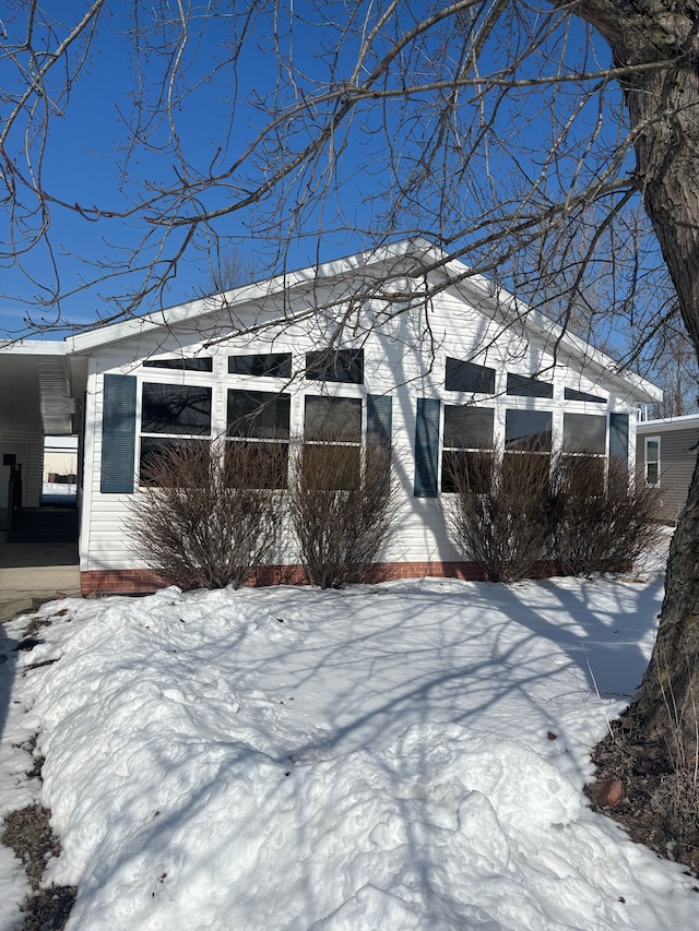 view of snow covered property