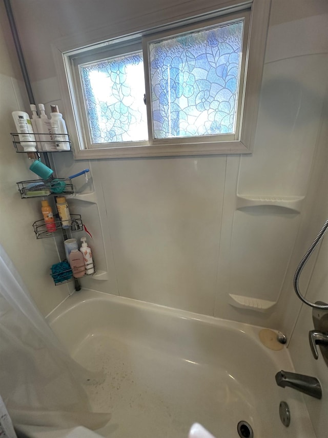 full bath with shower / tub combination