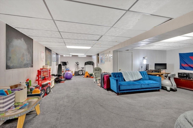 game room featuring carpet and a paneled ceiling