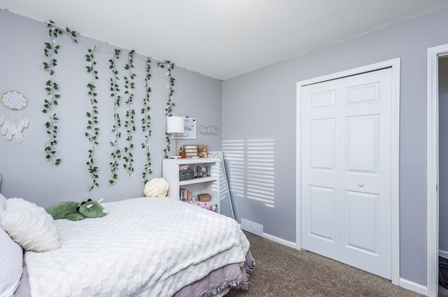 bedroom featuring carpet, visible vents, and baseboards