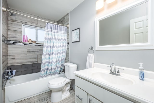 bathroom with vanity, toilet, and shower / bath combo